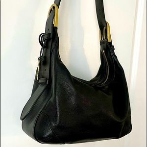 Like new, hardly used black leather Fossil bag. Very classy.
